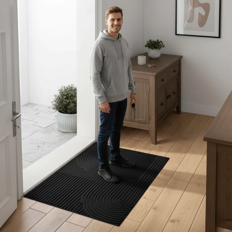 Elegant og Absorberende Dørmåtte med Moderne Kurve Design