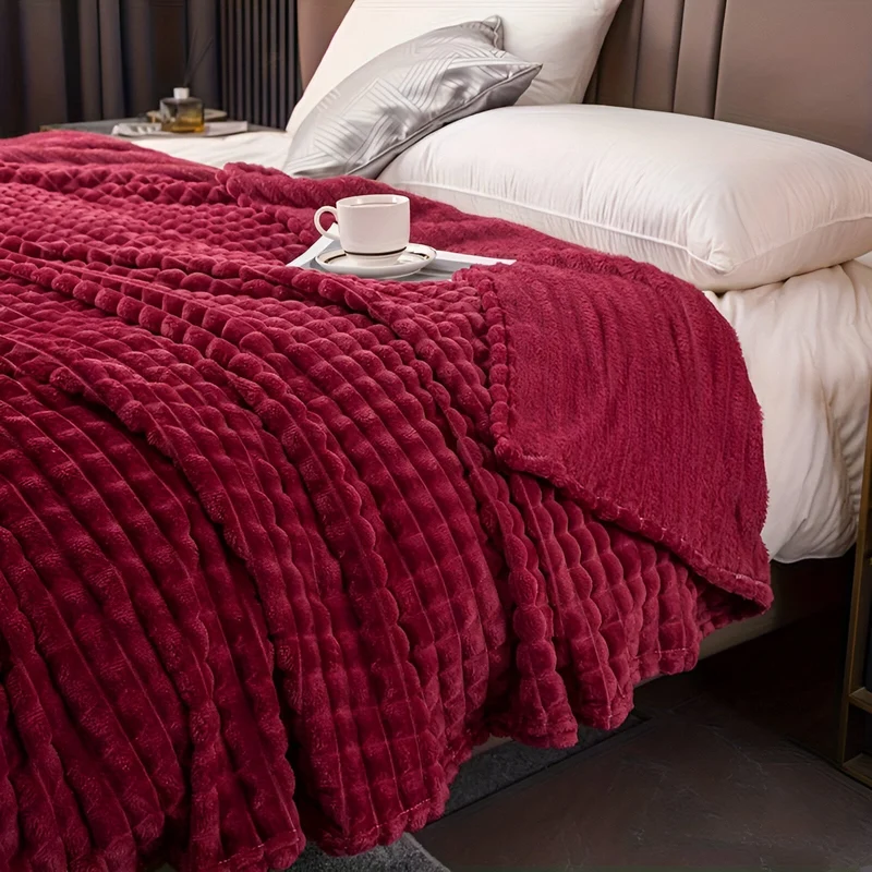 Ultrafluffy koralfarvet fleece-tæppe med struktureret plaid design
