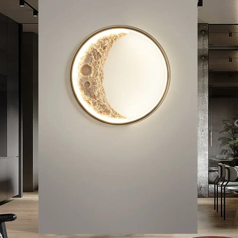 Elegant væglampe med måne-design for stemningsfuldt lys