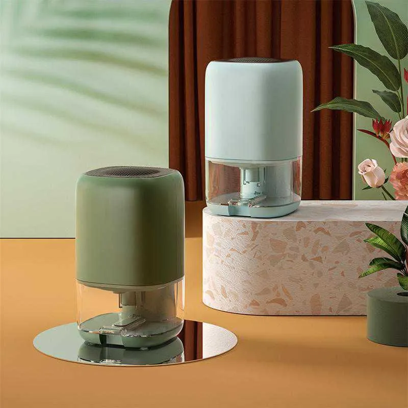 Mini Compact Air Dehumidifier Moisture Absorber with a Transparent Tank